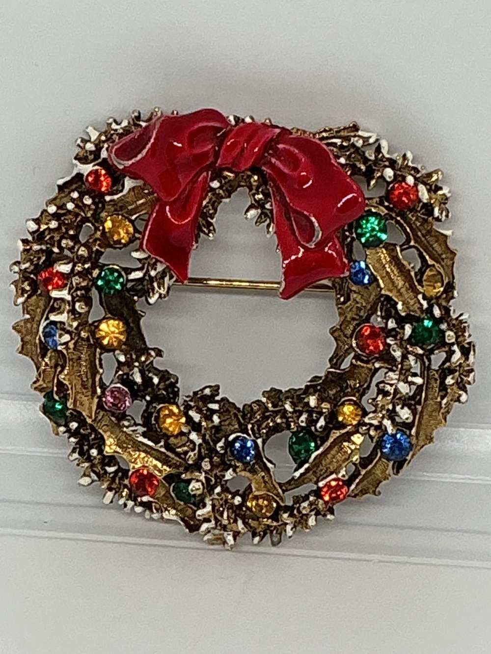 Vintage ART Signed Christmas Wreath Brooch Multicolor Rhinestone Red Bow Pin”